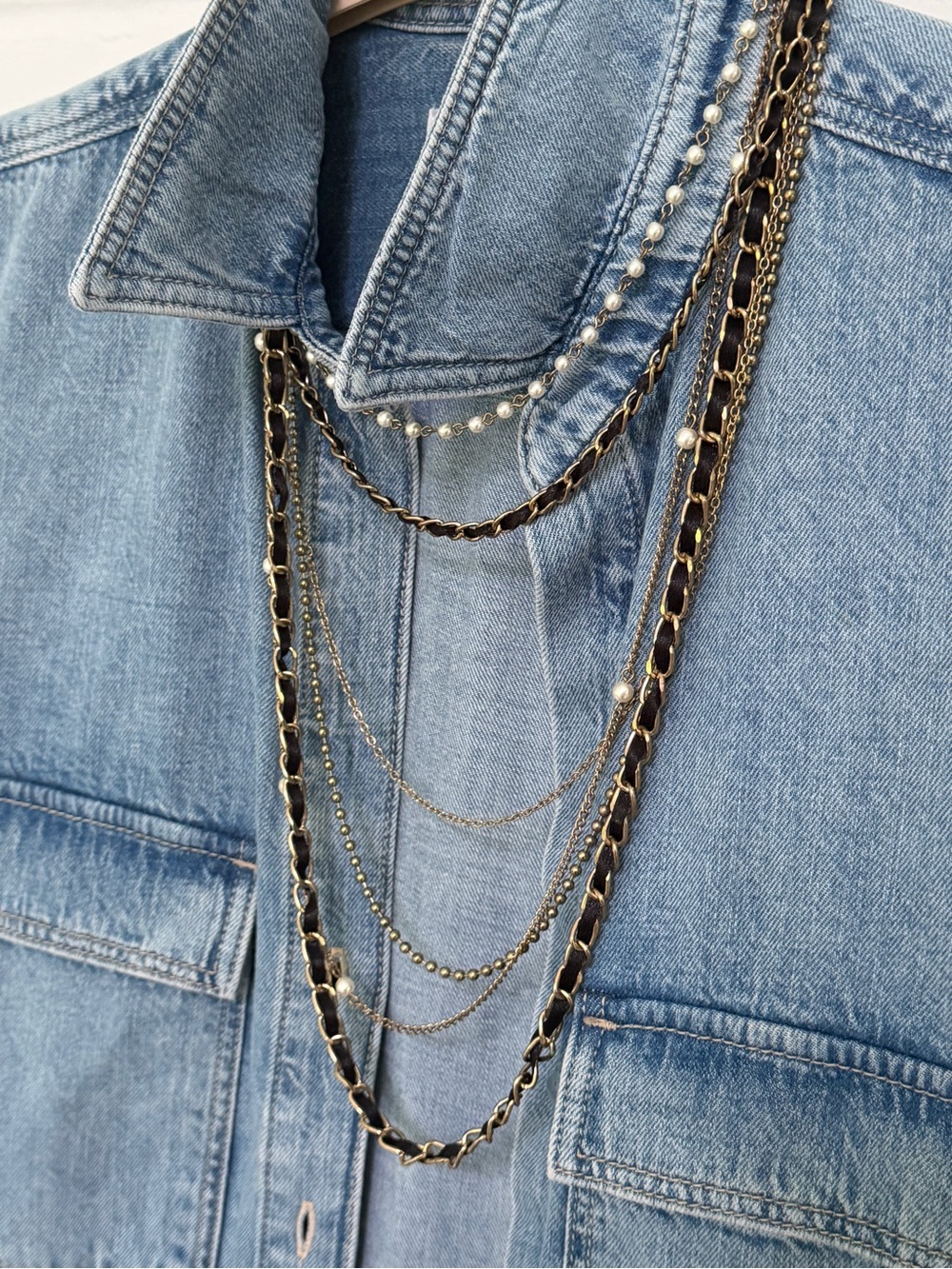 Multi-Strand Gold and Black Layered Necklace with Pearl Accents